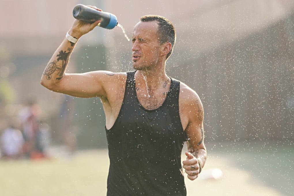 South China Morning Post sports reporter Patrick Blennerhassett takes a breather during a training session at Happy Valley, Hong Kong. He has been abstaining from alcohol since May. Photo: Antony Dickson