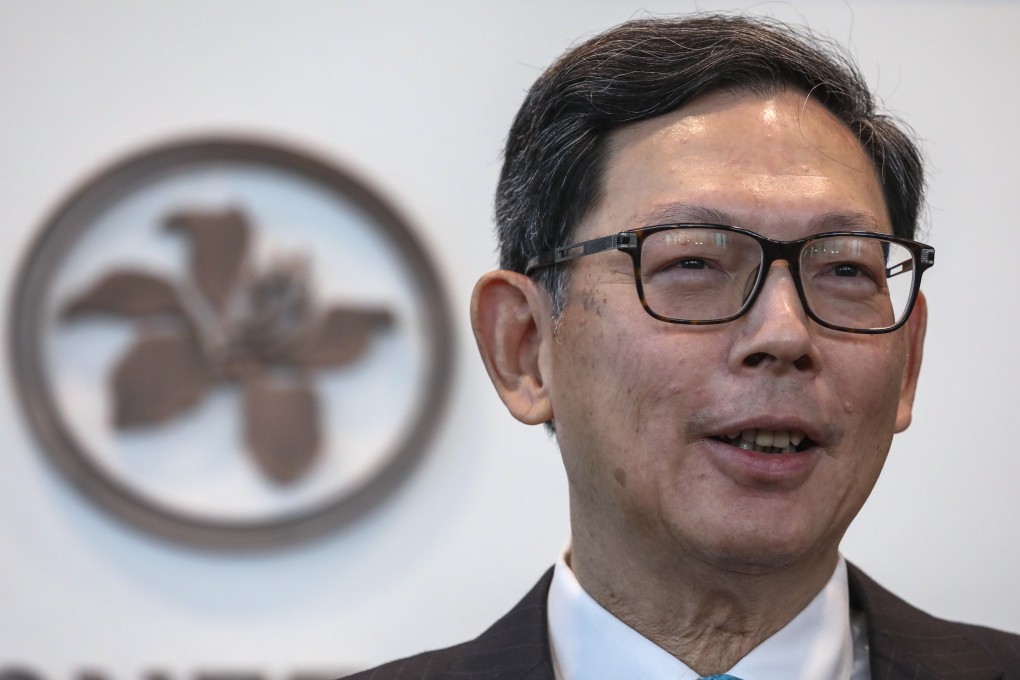 Retiring Hong Kong Monetary Authority chief executive Norman Chan Tak-lam meets the press at Two International Finance Centre (IFC) in Central. Photo: SCMP