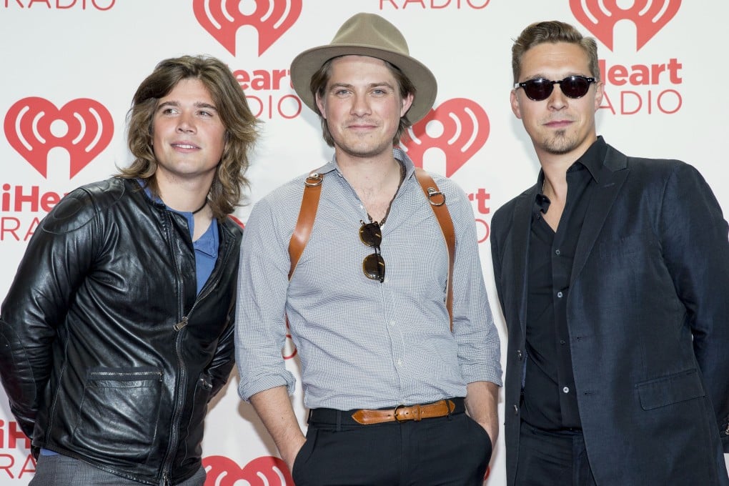 From left, Zac, Taylor, and Isaac Hanson, arrive at the iHeartRadio Music Festival. Photo: AP Images