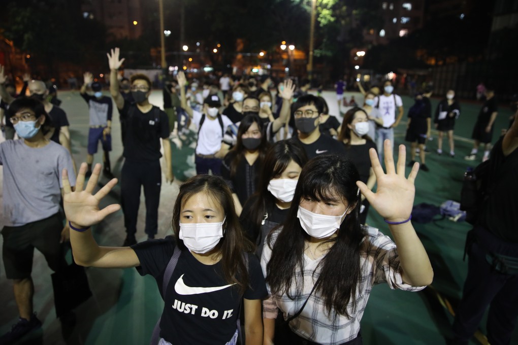 It is now against the law to wear masks at protests. Photo: Winson Wong