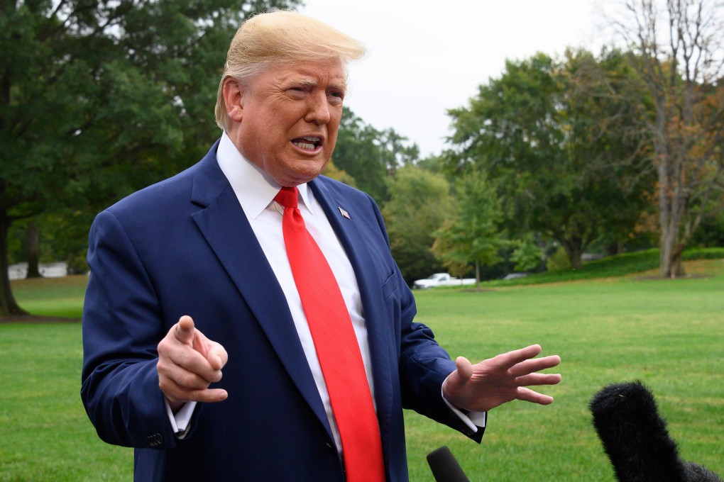 US President Donald Trump speaks to the press as he departs the White House. Photo: AFP