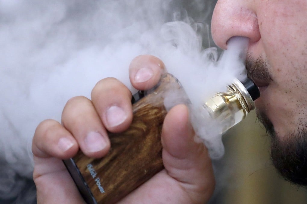 E-cigarettes were originally believed to be far safer than the real thing. Photo: AP PHotoFILE - In this Friday, Aug. 17, 2018 file photo, a man breathes vapes from an e-cigarette at a vape shop in London. While the U.S. scrambles to crack down on vaping, Britain has embraced electronic cigarettes as a powerful tool to help smokers kick the habit. (AP Photo/Frank Augstein, File)