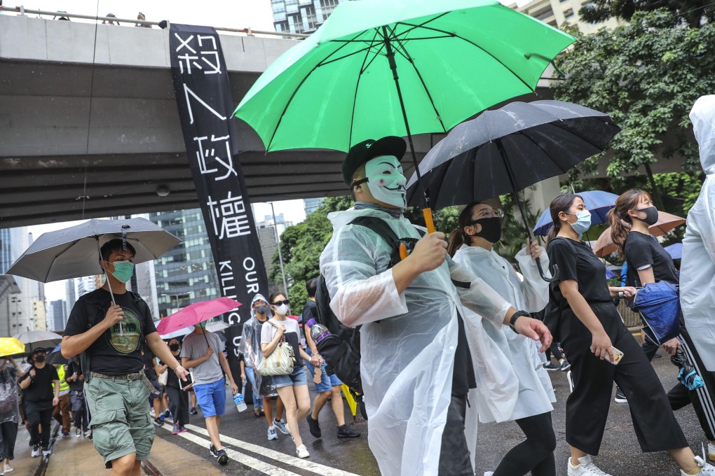Anti-government protesters rally from Causeway Bay to Central in defiance of the anti-mask law. Photo: Sam Tsang