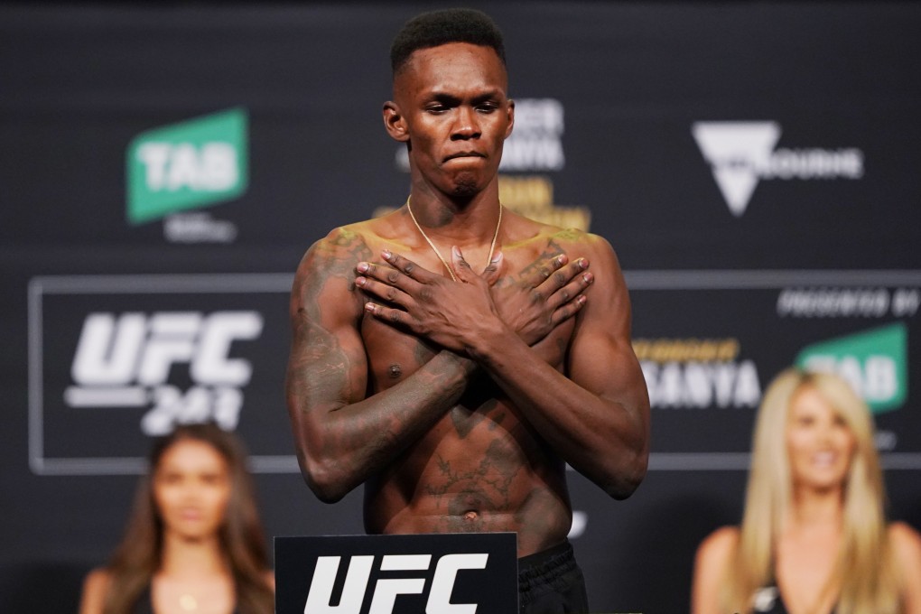 Israel Adesanya weighs in before UFC 243. Photo: EPA