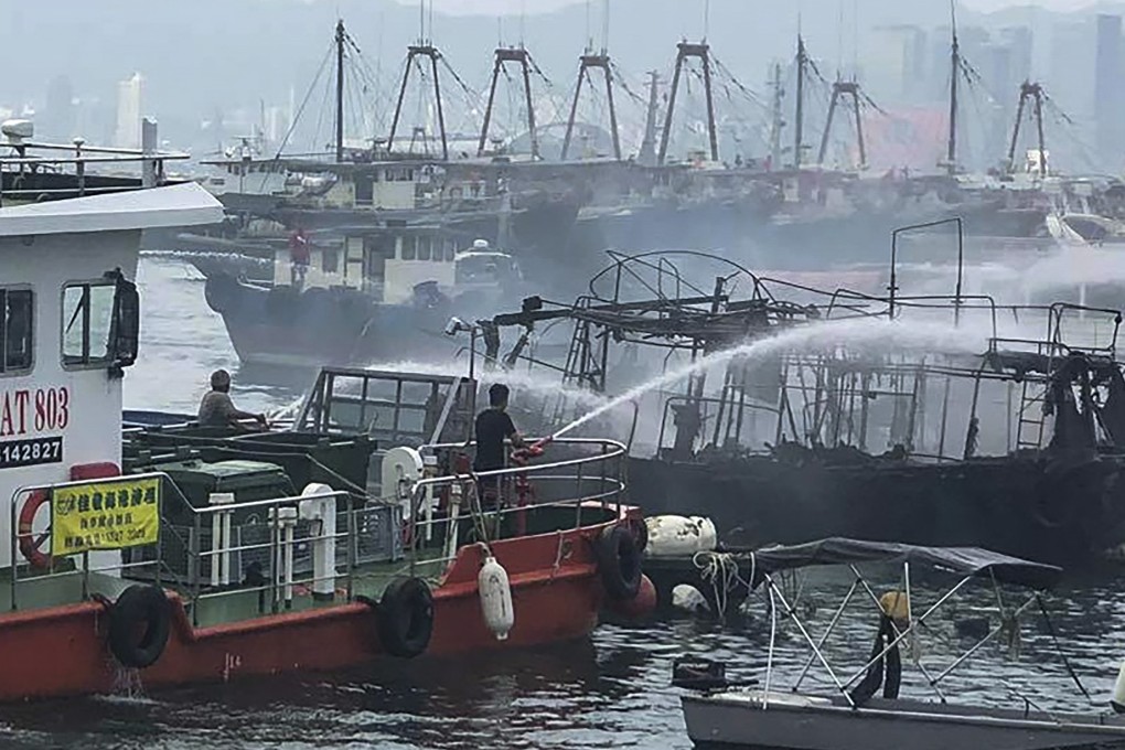 Firefighters putting out the flames at the typhoon shelter. Photo: Facebook