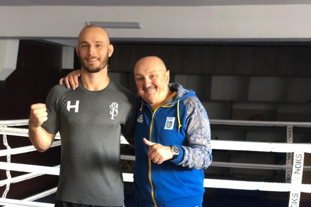Sasha Palatnikov with Ukraine national boxing team coach Dmitriy Sosnovskiy. Photo: Instagram