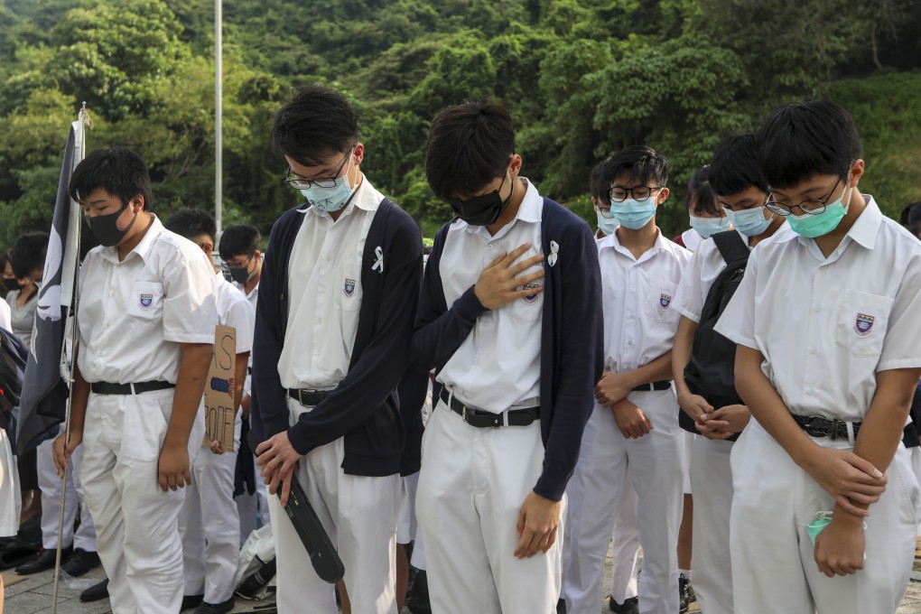 Students wear masks outside Shau Kei Wan government secondary school in Shau Kei Wan. Photo: Xiaomei Chen