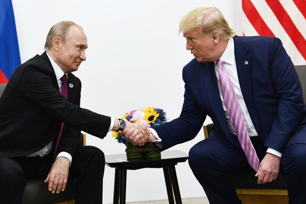 US President Donald Trump (right) at a meeting with Russian President Vladimir Putin during the G20 summit in Osaka in June. Photo: AFP