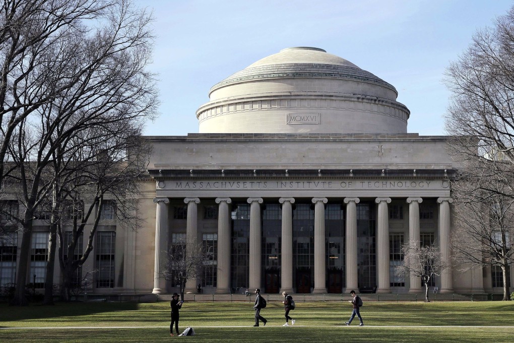 Students walk past the “Great Dome” atop Building 10 on the Massachusetts Institute of Technology campus in Cambridge, Massachusetts. The school says it will review all existing relationships with organisations added to the US Department of Commerce’s Entity List. Photo: AP
