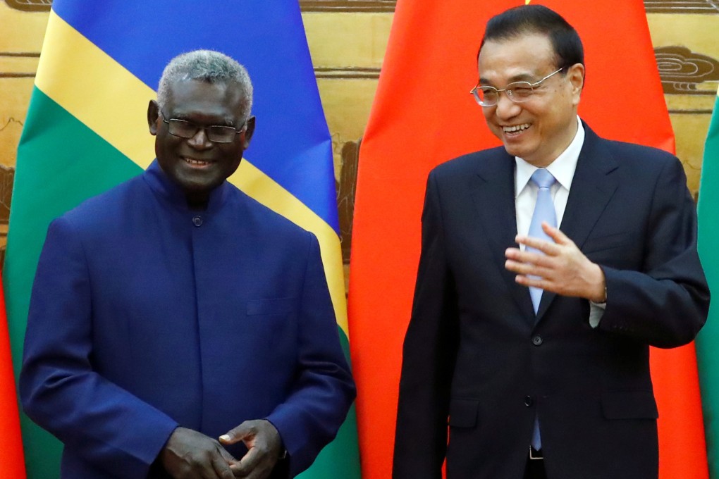 Chinese Premier Li Keqiang and Solomon Islands Prime Minister Manasseh Sogavare meet at the Great Hall of the People in Beijing on Wednesday. Photo: AP