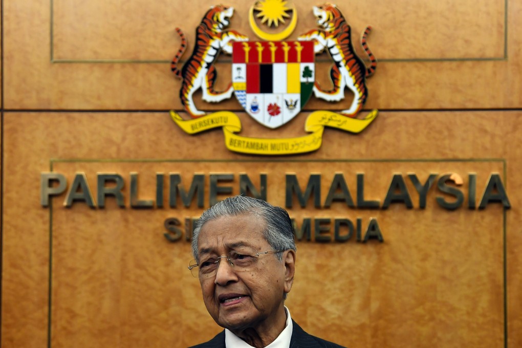 Malaysian Prime Minister Mahathir Mohamad speaks after attending a session of parliament. Photo: DPA