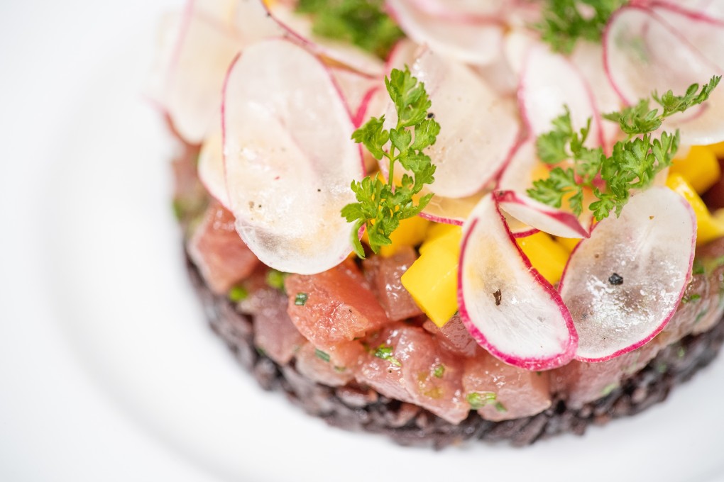 Chef Pierre Gagnaire is serving Italian dishes (such as this red tuna with black rice, above) from his restaurant Piero TT in France at his Hong Kong outlet Pierre. Photo: courtesy of Mandarin Oriental Hong Kong