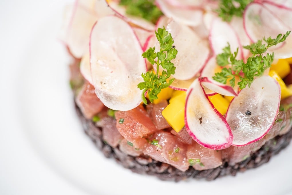 Chef Pierre Gagnaire is serving Italian dishes (such as this red tuna with black rice, above) from his restaurant Piero TT in France at his Hong Kong outlet Pierre. Photo: courtesy of Mandarin Oriental Hong Kong