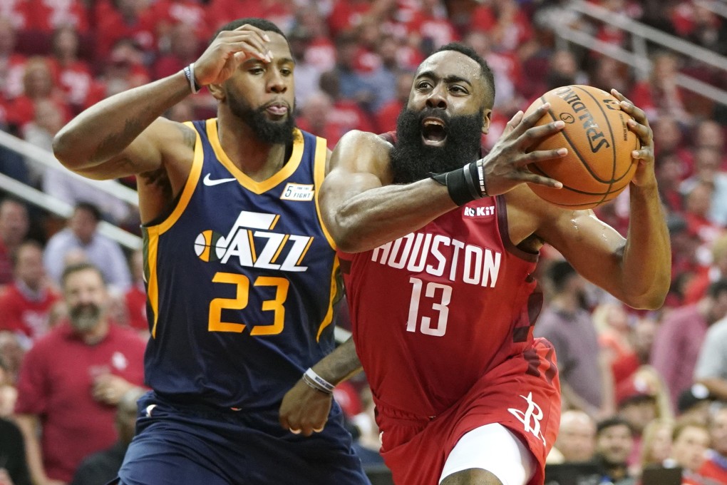 In this April 17, 2019, file photo, Houston Rockets guard James Harden (right) drives against Utah Jazz forward Royce O’Neale during a first-round NBA basketball playoff series in Houston. Photo: AP