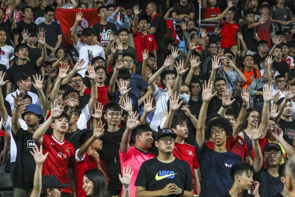 Fans at the Hong Kong v Iran match at Hong Kong Stadium in Happy Valley. Photo: Felix Wong