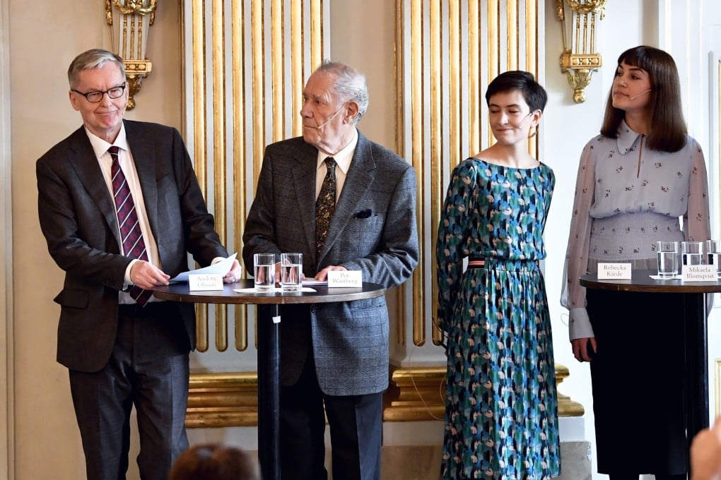 Members of the Swedish Academy announce the winners of the 2018 and 2019 Nobel Prize in Literature. Photo: TT via AP