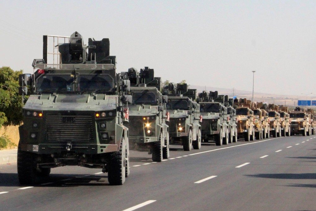 A Turkish military convoy in Kilis near the Turkish-Syrian border. Photo: IHA via Reuters