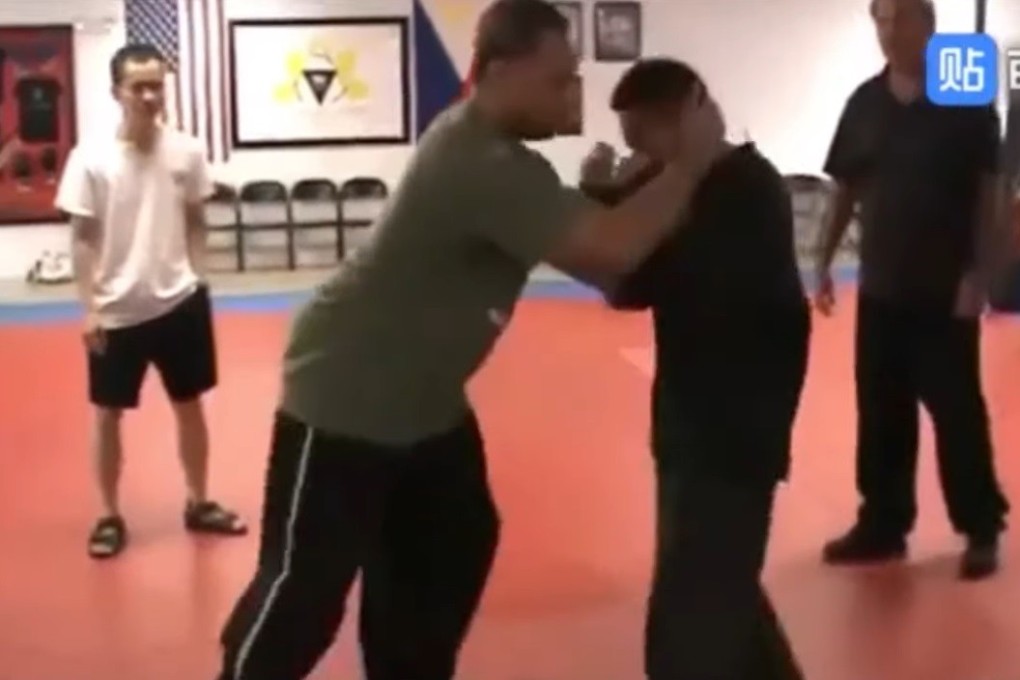 A Muay Thai practitioner clinches a kung fu master. Photo: YouTube/Fight Commentary Breakdowns