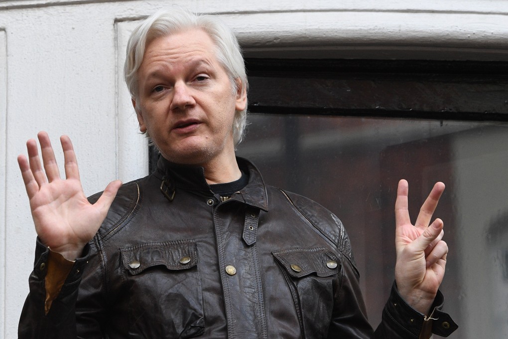 WikiLeaks founder Julian Assange speaks to reporters from the balcony of the Ecuadorean embassy in London in May 2017. Photo: EPA-EFE