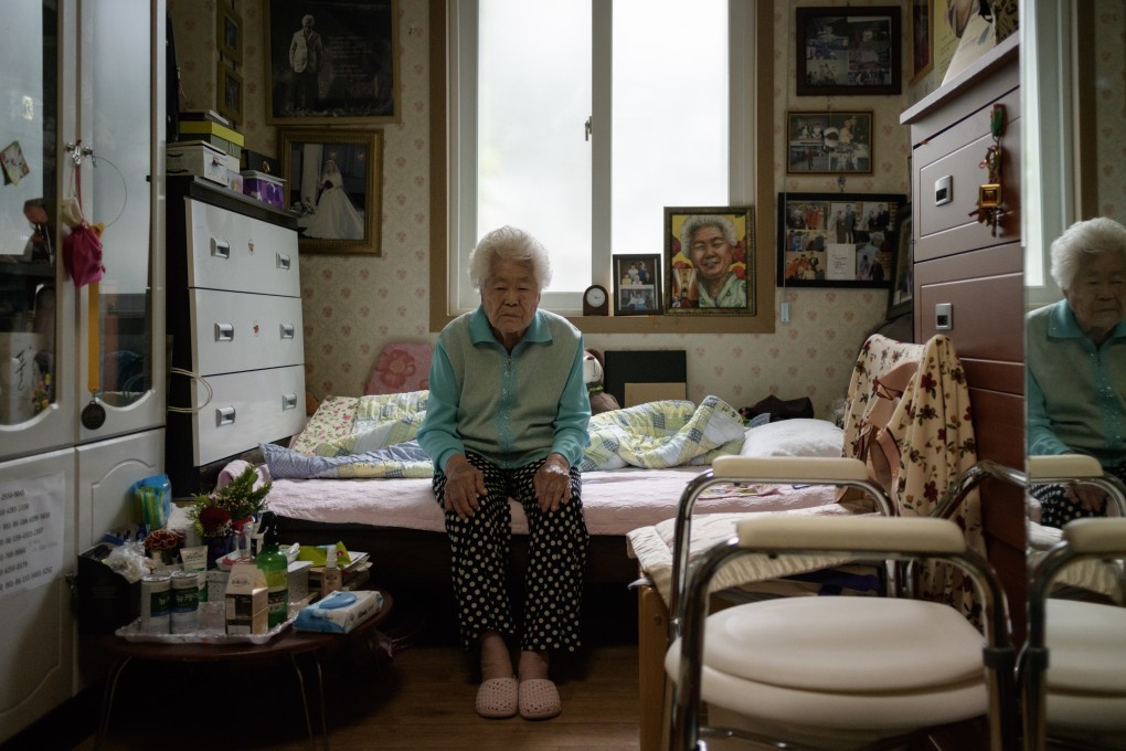 Lee Ok-sun in her bedroom at the Sharing House, a nursing home east of Seoul for South Korean former sex slaves of the Japanese army in World War II. Her life story is told in Grass, a graphic novel by Keum Suk Gendry-Kim. Photo: AFP