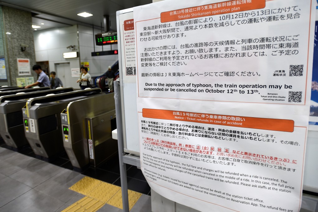 A travel warning sign about possible train suspensions at Hamamatsu railway station. Photo: Reuters