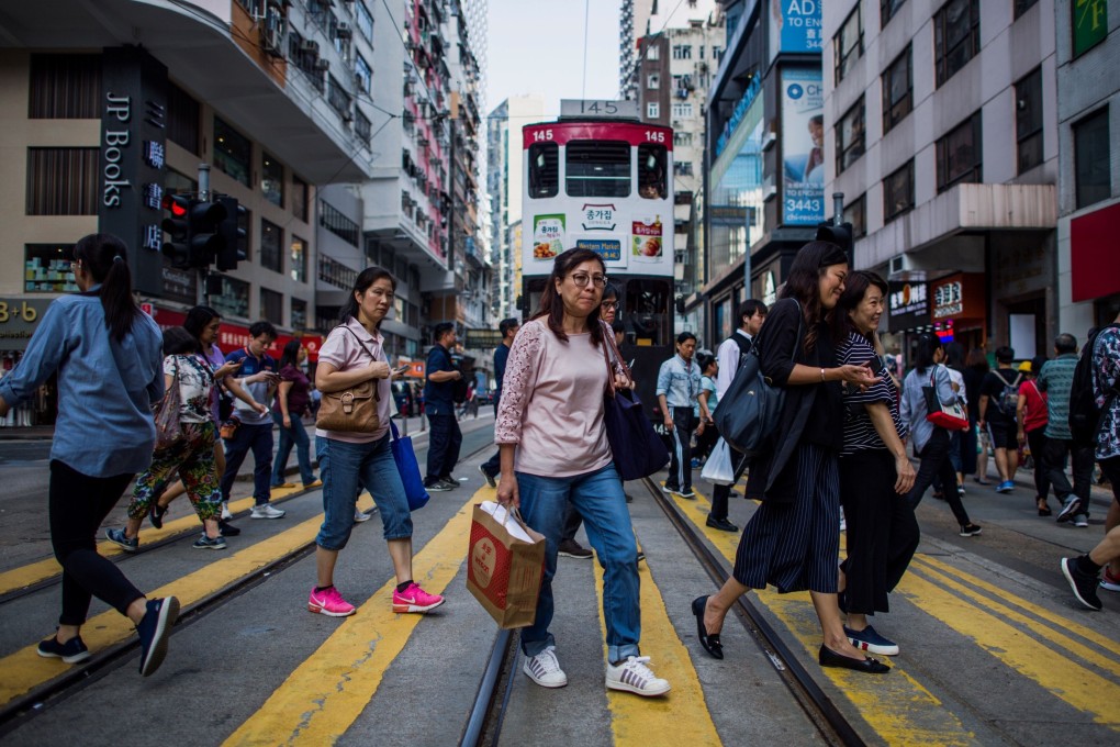 About one-fifth of the Hongkongers surveyed showed no confidence in Beijing and the city’s overcrowded living conditions. Photo: AFP