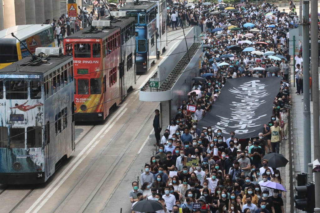 Hundreds of protesters march in Central. Photo: Felix Wong