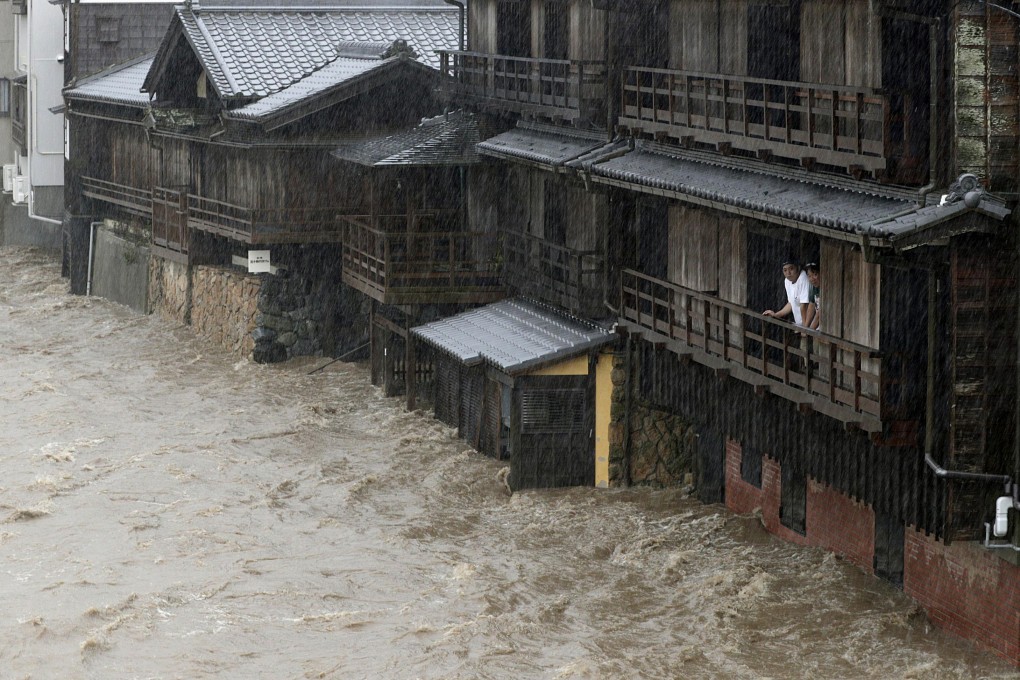 The Isuzu River in Ise, central Japan, is swollen by Typhoon Hagibis. Photo: Kyodo via AP