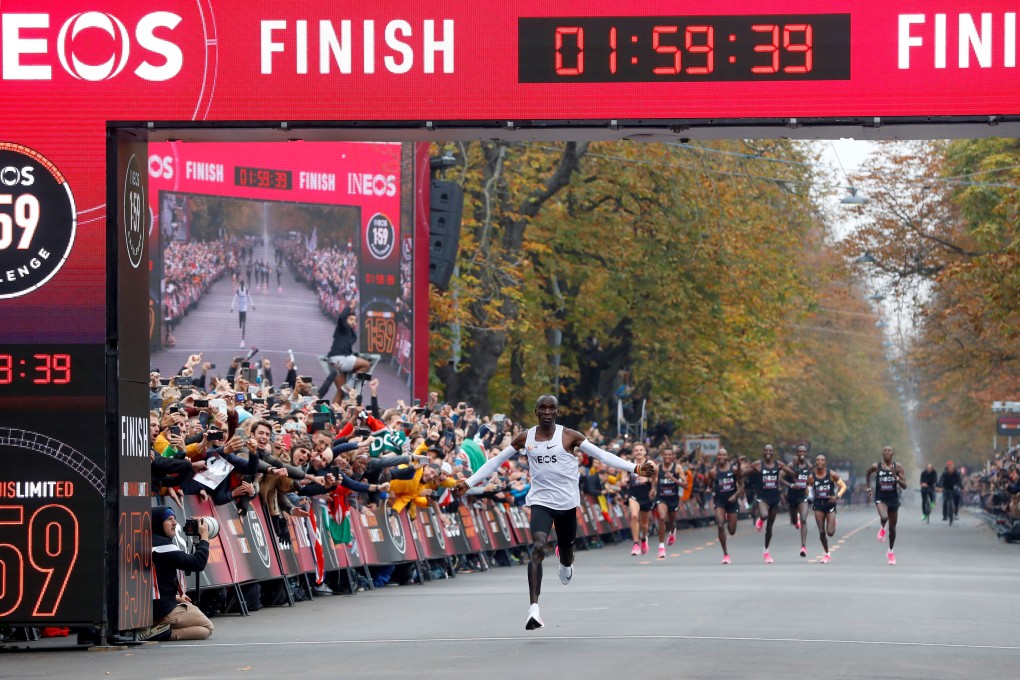 Kenya's Eliud Kipchoge, the marathon world record holder, crosses the finish line during his successful attempt to run a marathon in under two hours in Vienna. Photo: Reuters