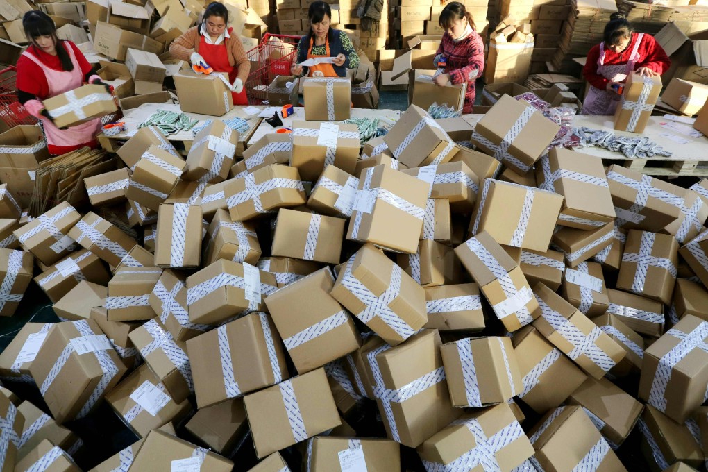 File photo of workers preparing to deliver online purchases at a sorting centre in Jiangsu province. Photo: AFP