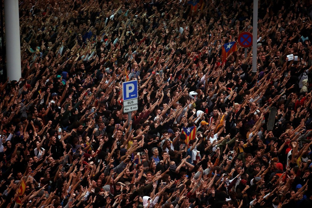 Demonstrators flooded the streets of Barcelona before marching towards El Prat, Spain’s second busiest airport, where they briefly choked-off road and rail access. Photo: EPA