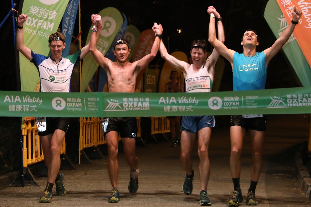 Team Gone Running-Joint Dynamics: (from left) Brian McFlynn; John Ellis; Jeff Campbell; and Michael Skobierski, winning the 2018 Oxfam Trailwalker. Photo: Felix Wong