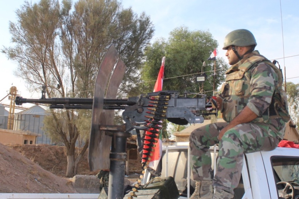 A Syrian soldier in the town of Tall Tamr in the countryside of Syria’s Hasakah province on Tuesday. Photo: Xinhua