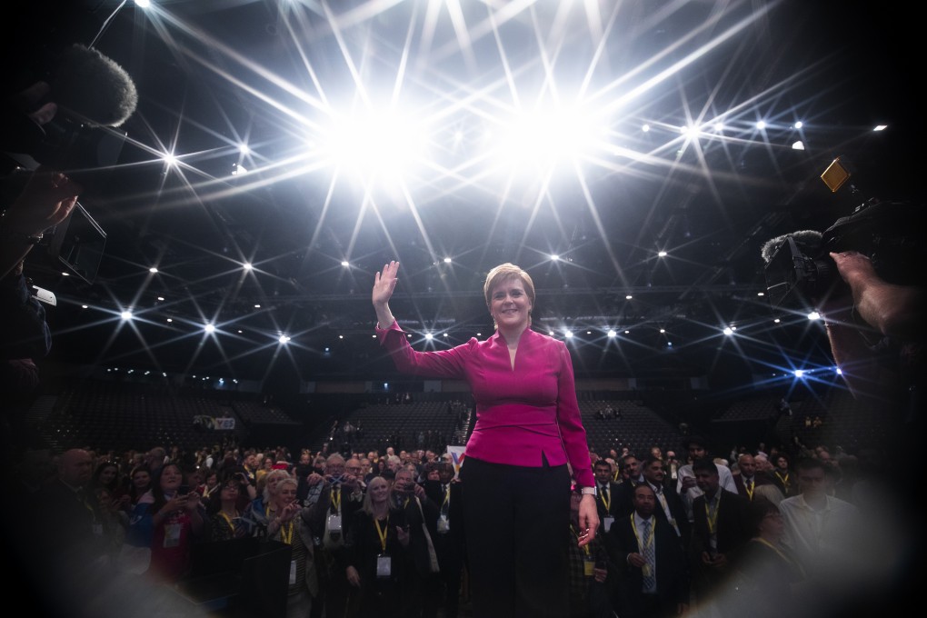 First Minister of Scotland Nicola Sturgeon waves after delivering her keynote speech during the SNP autumn conference in Aberdeen on Tuesday. Photo: dpa