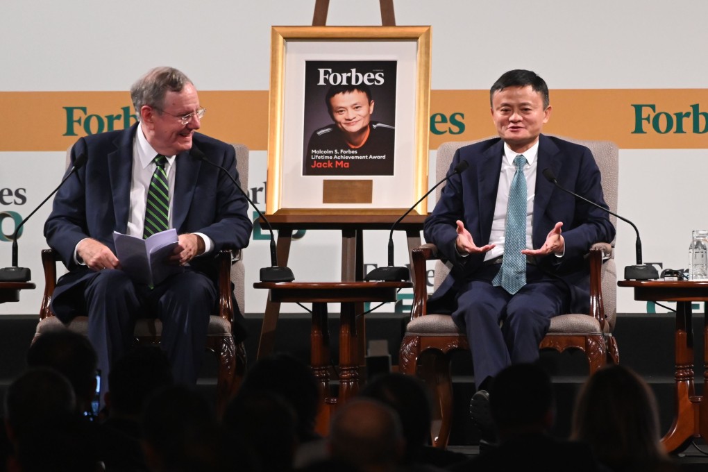 Jack Ma, founder and former executive chairman of Alibaba Group Holding, speaks next to Forbes Media chairman and editor-in-chief Steve Forbes, left, during the Forbes Global CEO Conference in Singapore on October 15. Photo: Agence France-Presse