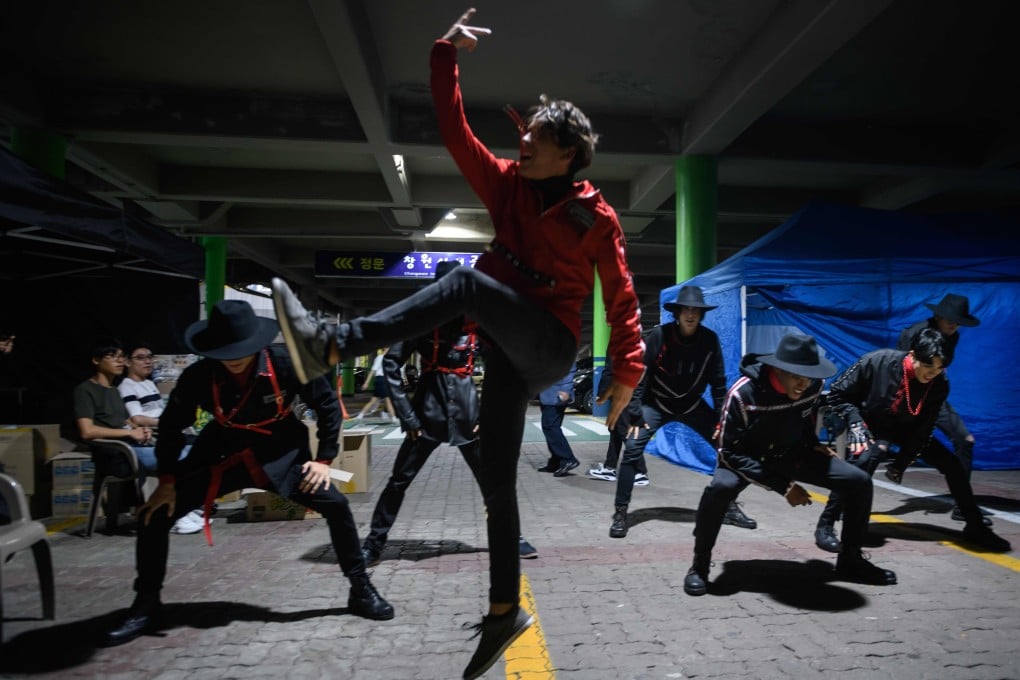 Competitors from Cuba practise backstage at the K-pop World Festival in Changwon. Photo: Ed Jones/AFP