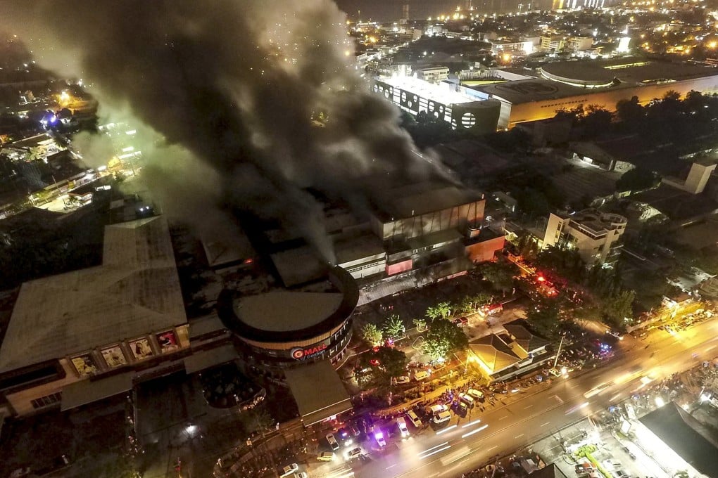 A burning mall in General Santos City. Photo: EPA