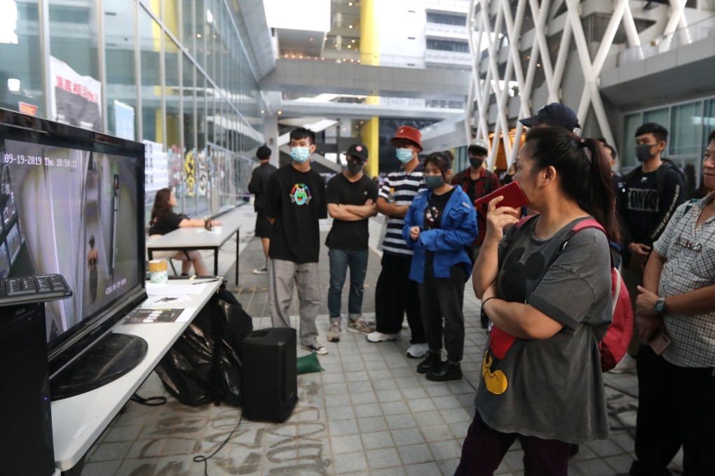 Residents come to the campus to view the newly released clips. Photo: Xiaomei Chen