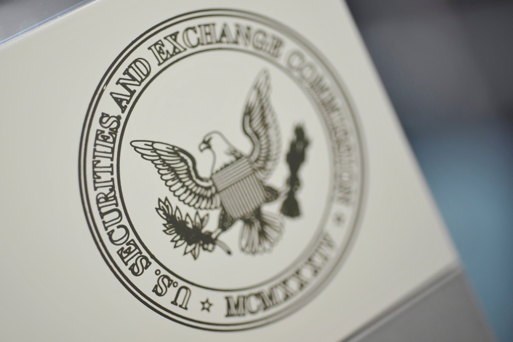 The US Securities and Exchange Commission logo is seen on an office door at the SEC headquarters in Washington in June 2011. Photo: Reuters