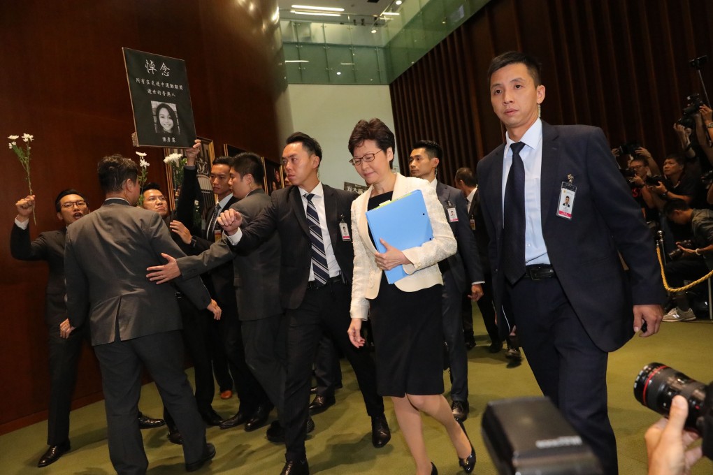 Chief Executive Carrie Lam enters the Legislative Council in her first attempt to give this year’s policy address. Photo: May Tse
