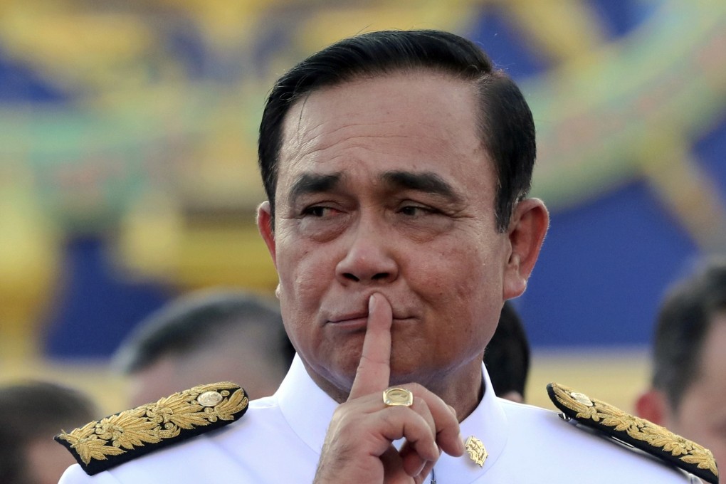 Thailand’s Prime Minister Prayuth Chan-ocha during a group photo with his cabinet members at the government house in Bangkok. Photo: AP