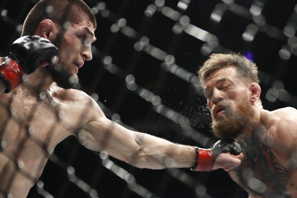 Khabib Nurmagomedov punches Conor McGregor at UFC 229. Photo: AP