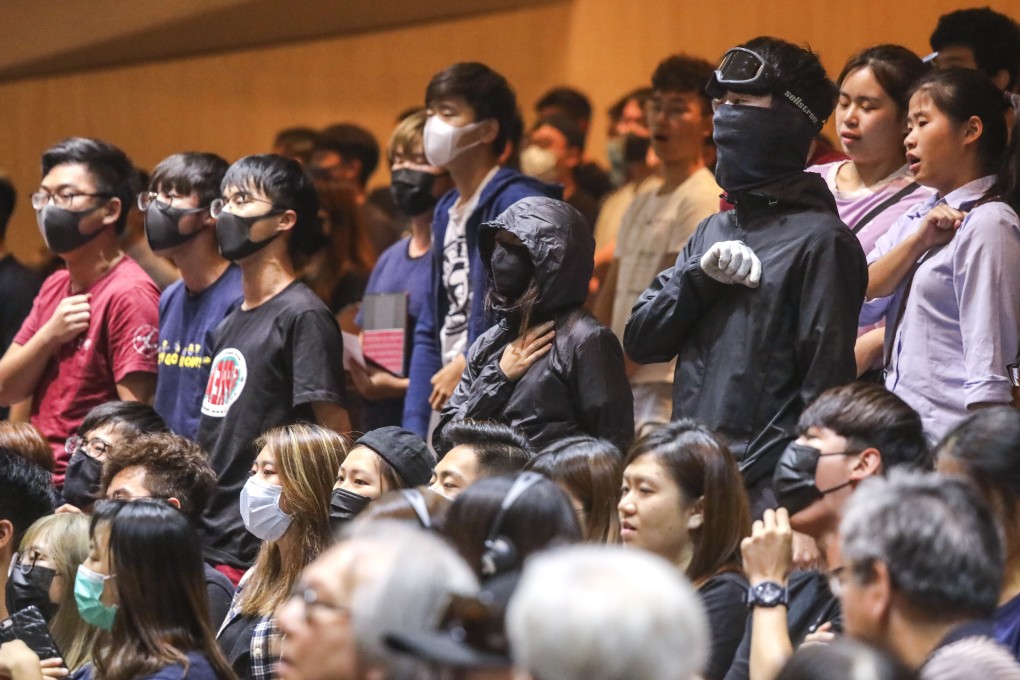 Chinese University students and alumni, some in protesters’ gear, at an earlier dialogue session with vice-chancellor Rocky Tuan. Photo: K.Y. Cheng