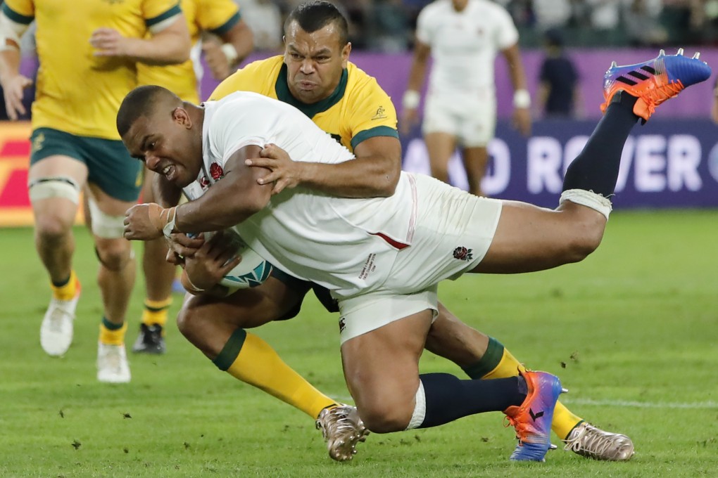 England's Kyle Sinckler scores a try against Australia during the quarter-final of the Rugby World Cup at Oita Stadium. Photo: AP