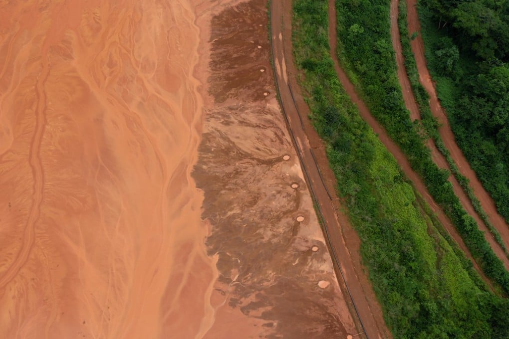 An aerial view of a massive pond used to collect waste water from the Awaso bauxite mine. Photo: Thomas Cristofoletti / Ruom