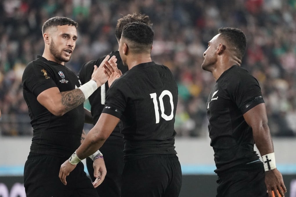 New Zealand’s Richie Mo’unga (centre) and Sevu Reece (right) celebrate scoring a try during their Rugby World Cup quarter-final win over Ireland. Photo: EPA