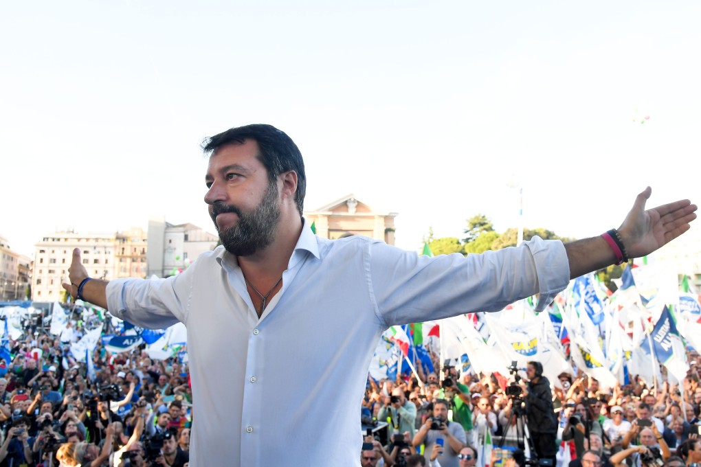 Leader of Italy's far-right League party, Matteo Salvini gestures as he prepares to address supporters during a rally of Italy's far-right League party. Photo: AFP