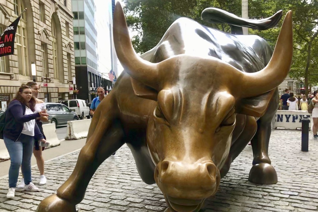 The Charging Bull statue near the New York Stock Exchange. The bull run has taken on death-defying qualities. Photo: Kyodo