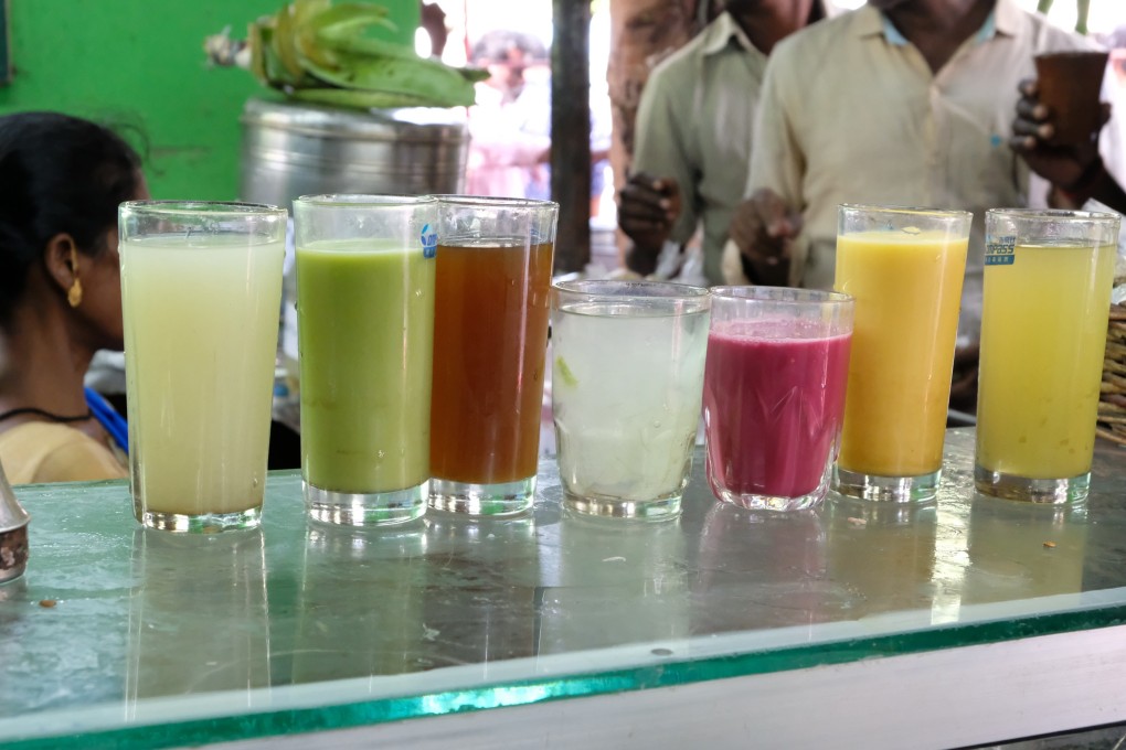 After his mother’s arthritis was treated with natural prodicts, Maran G started selling packets of sprouts, then opened a cafe selling health drinks and soups in Tamil Nadu, India. Photo: Malaineer Girithar
