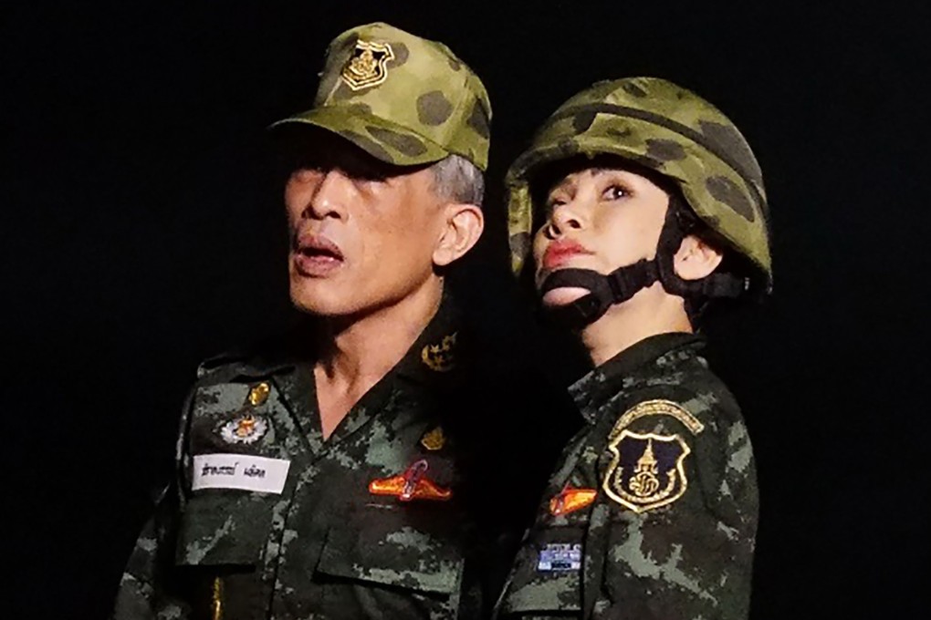 Thailand's King Maha Vajiralongkorn standing with royal noble consort Sineenat Bilaskalayani, also known as Sineenat Wongvajirapakdi. Photo: AFP